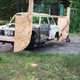 The homebuilt wooden rig used to strip down absolutely everything in the original car.